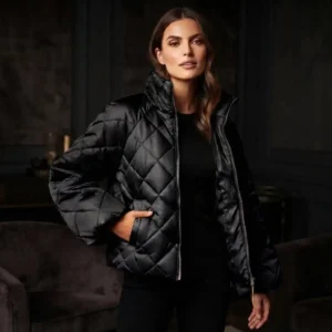 Oversized tussen jas met rits sluiting en steekzakken met pofmouw